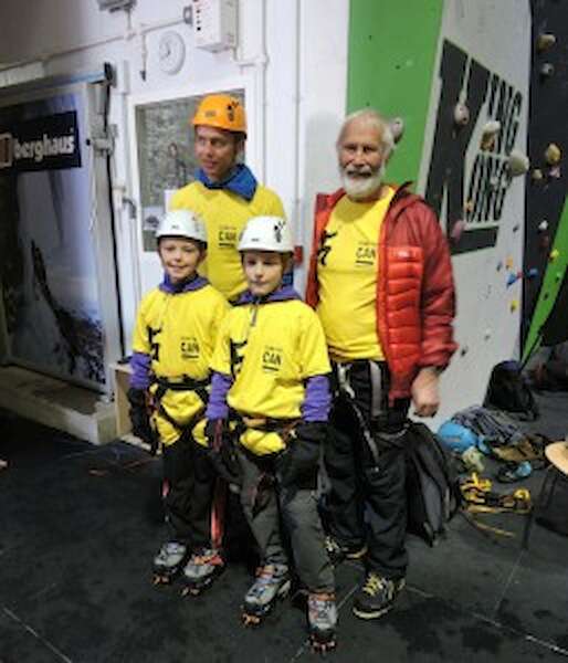 Leo Houlding and Chris Bonington with local schoolchildren prepare for the start of Climb For CAN