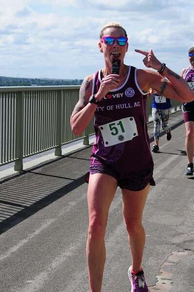 woman running a race