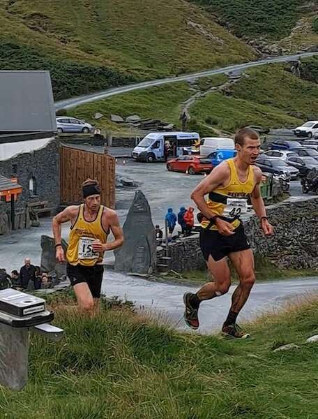 2 men racing on a fell race